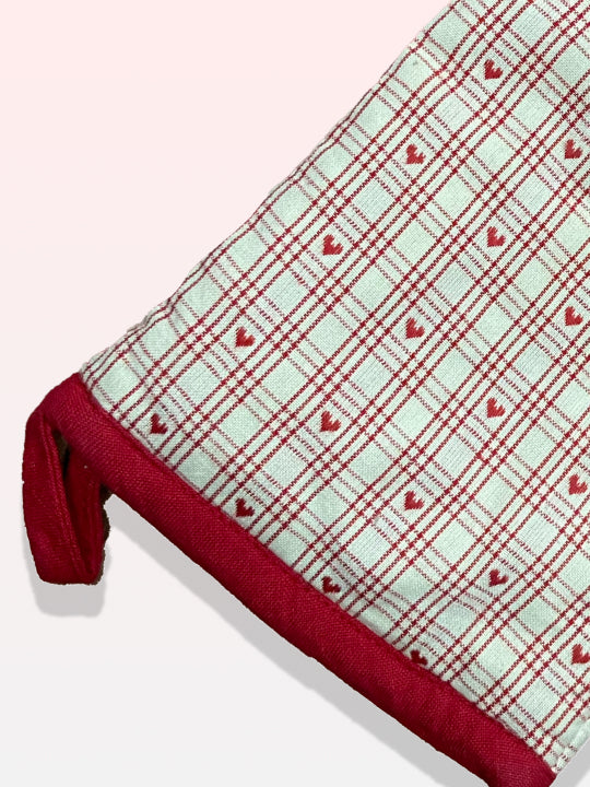 white and red checkered oven glove