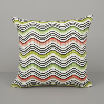 Decorative pillow with wavy striped pattern on a gray background